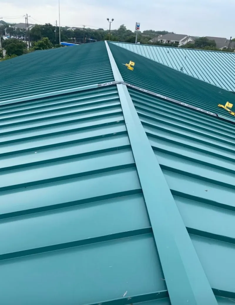 Green commercial metal roof ridge and valley for Metal Roof Repair in Crafton
