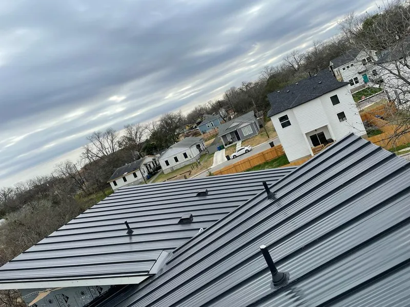 Standing seam metal roof panels with vents for Skylight Repair in Crafton